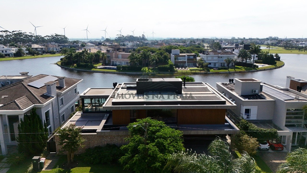 Foto 11 — Casa em Condomínio no Bosques de Atlântida.